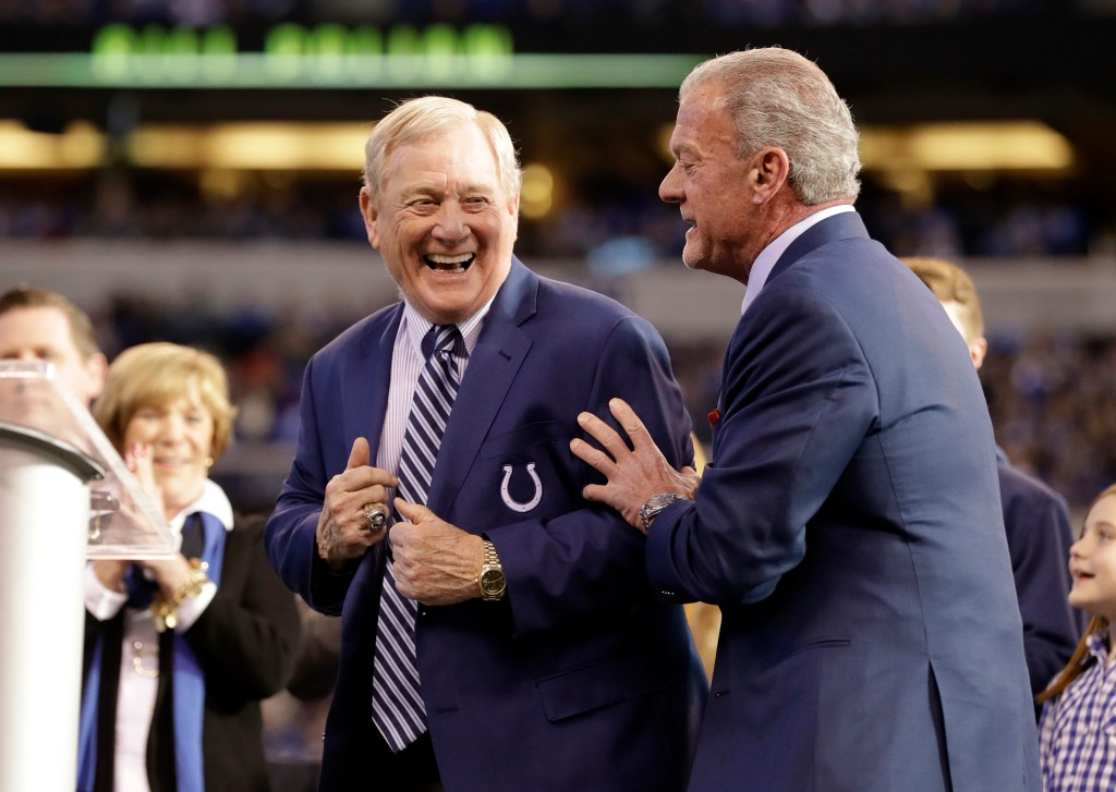Jim Irsay congratulating Bill Polian for his induction into the Colts' Ring of Honor.