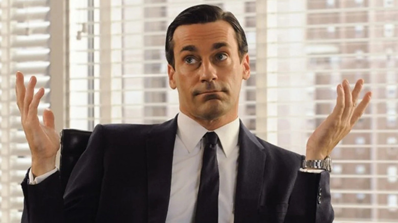 Jon Hamm's Don Draper shrugging on Mad Men