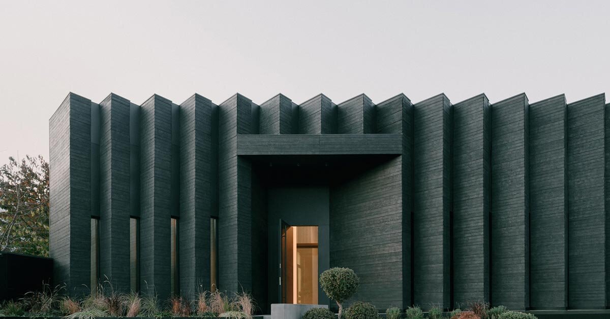 serrated charred wood shell encloses residence in tbilisi