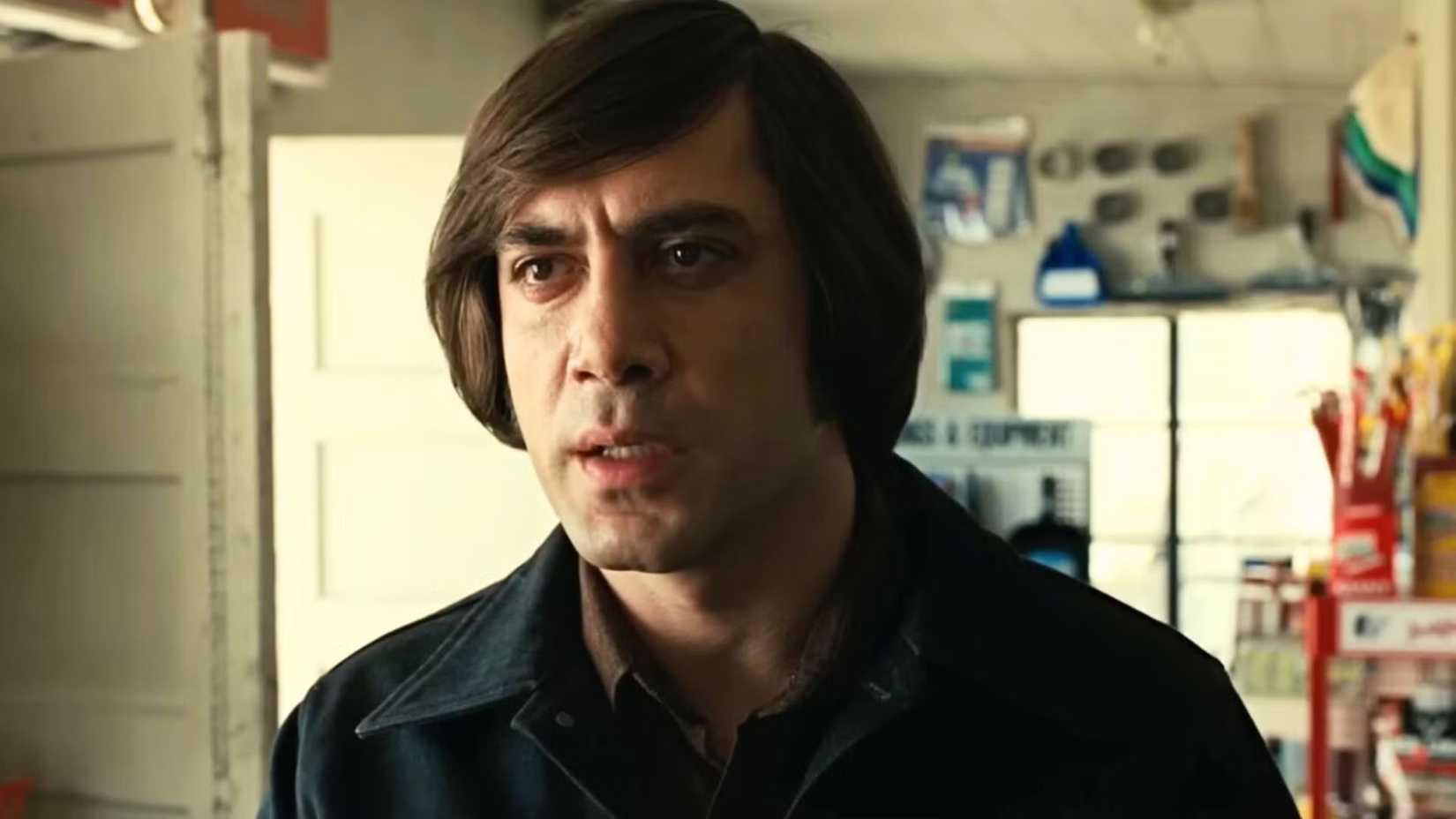 Javier Bardem as Anton Chigurh in the store in No Country for Old Men