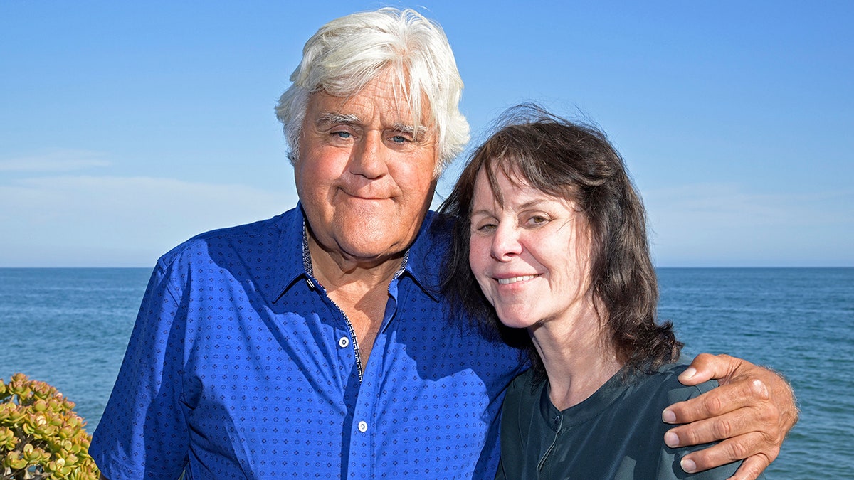 Jay Leno and Mavis Leno pose together in Malibu, California.