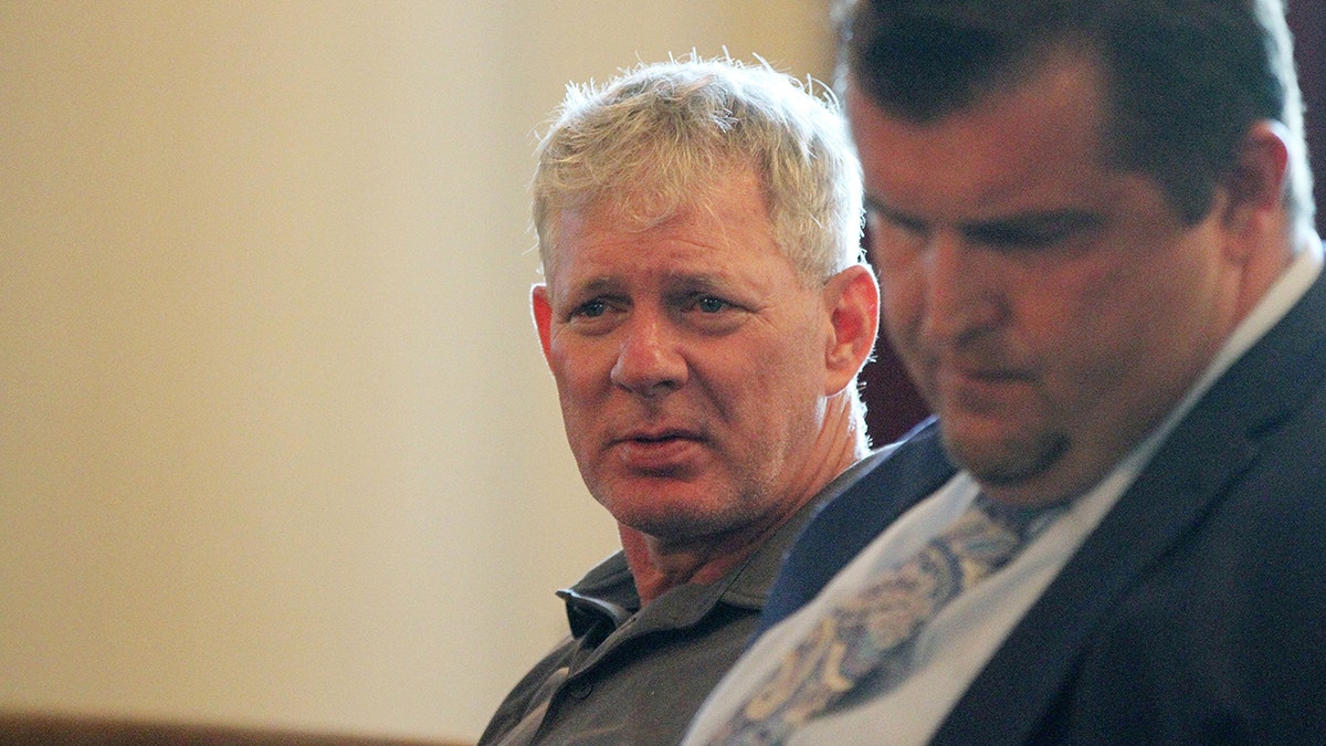 Lenny Dykstra looks on in court