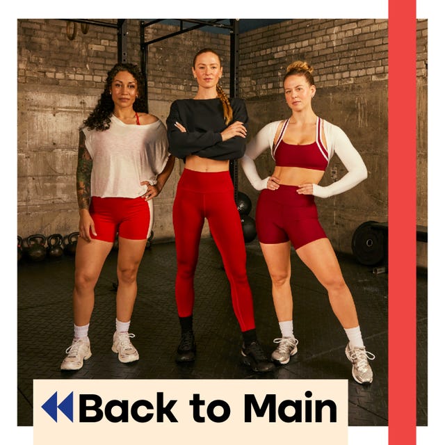 three individuals posing in a gym setting