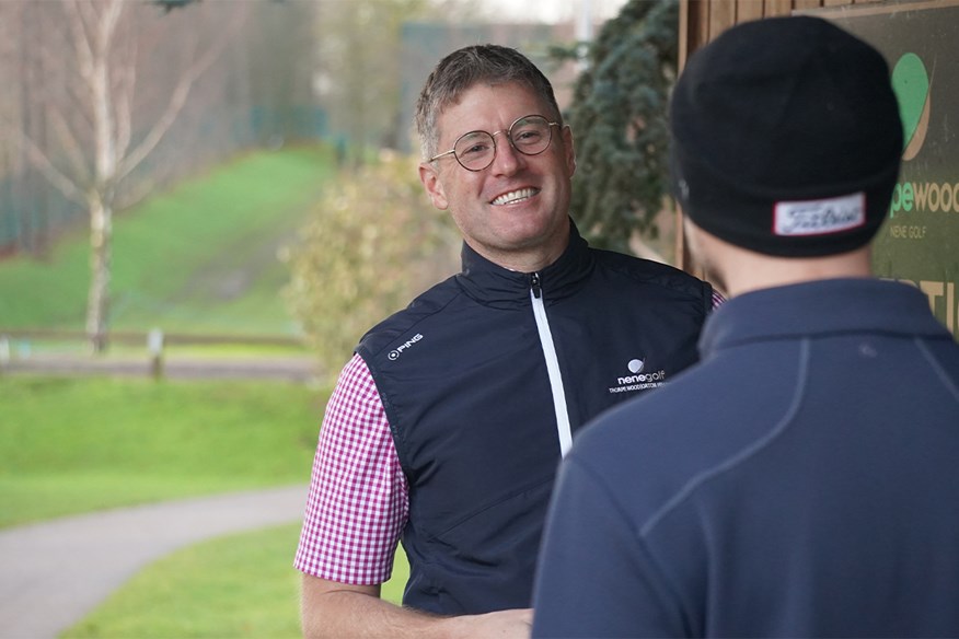 Luke Rich, Nene Park's General Manager, speaks with a club member