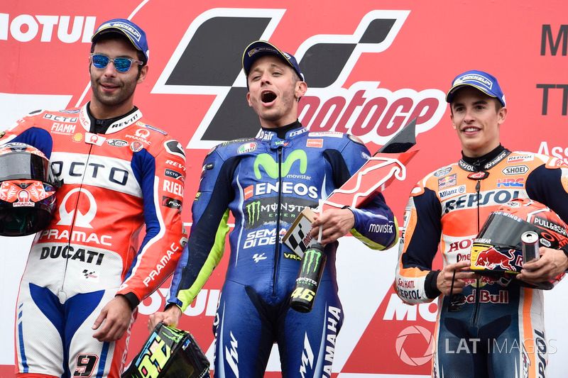 Podium: second place Danilo Petrucci, Pramac Racing, Race winner Valentino Rossi, Yamaha Factory Racing, third place Marc Marquez, Repsol Honda Team