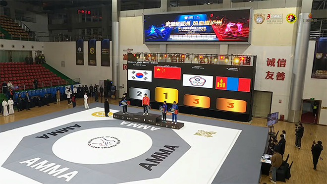 Kim Min-gun (left) of the Korea MMA General Association participates in the men's Hyundai 65kg silver medal ceremony at the 3rd Asian MMA Championships in Luzhou, Sichuan Province, China, in January 2026. Mixed martial arts will be held as an official event at the 20th Aichi-Nagoya Summer Asian Games in Japan from September 20 to 22. Photo = AMMA