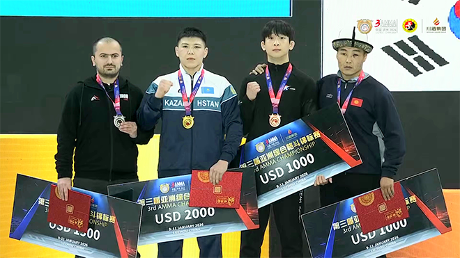 Choi Eun-seok of the Korea MMA General Association takes a photo to commemorate the men's 71kg bronze medal at the 3rd Asian MMA Championship in Luzhou, Sichuan Province, China, in January 2026. Mixed martial arts will be held as an official event at the 20th Aichi-Nagoya Summer Asian Games in Japan from September 20 to 22. Photo = AMMA