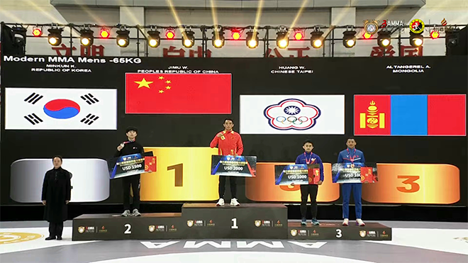 Kim Min-gun (left) of the Korea MMA General Association participates in the men's Hyundai 65kg silver medal ceremony at the 3rd Asian MMA Championships in Luzhou, Sichuan Province, China, in January 2026. Mixed martial arts will be held as an official event at the 20th Aichi-Nagoya Summer Asian Games in Japan from September 20 to 22. Photo = AMMA