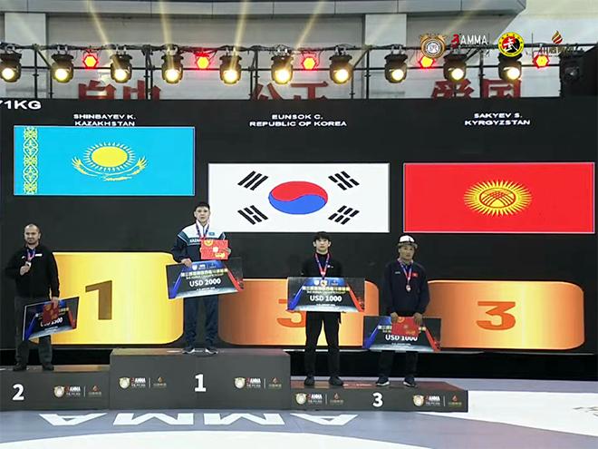 Choi Eun-seok of the Korea MMA General Association participates in the men's Hyundai 71kg bronze medal ceremony at the 3rd Asian MMA Championships in Luzhou, Sichuan Province, China, in January 2026. Mixed martial arts will be held as an official event at the 20th Aichi-Nagoya Summer Asian Games in Japan from September 20 to 22. Photo = AMMA