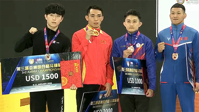 Kim Min-gun (left) of the Korea MMA General Association takes a photo to commemorate the men's 65kg silver medal at the 3rd Asian MMA Championship in Luzhou, Sichuan Province, China, in January 2026. Mixed martial arts will be held as an official event at the 20th Aichi-Nagoya Summer Asian Games in Japan from September 20 to 22. Photo = AMMA