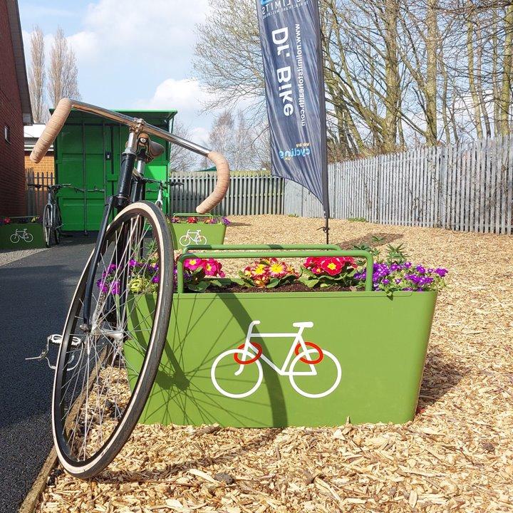 No Limits to Health, Wolverhampton - A bicycle parked in a green container