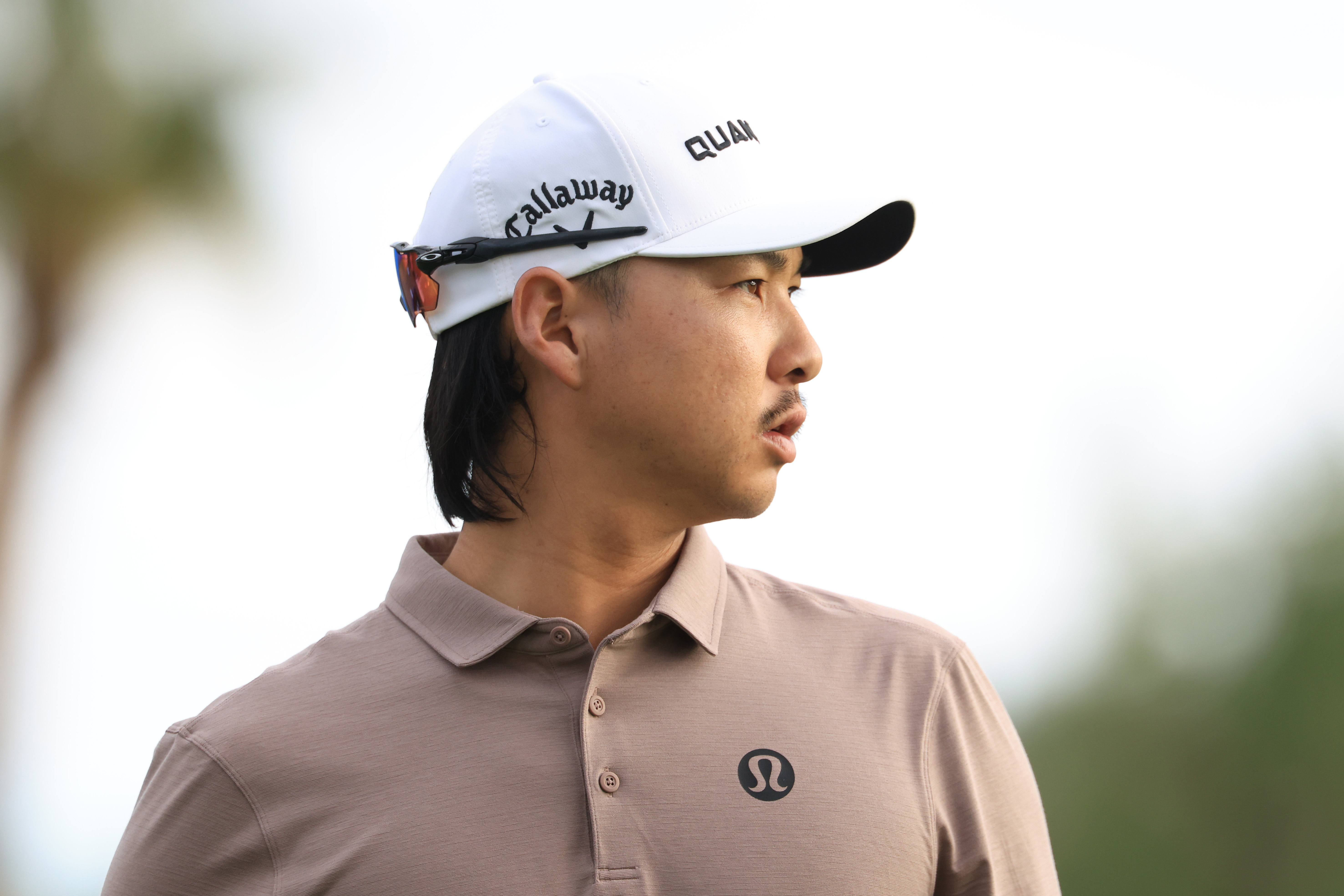 Min Woo Lee looks into the distance