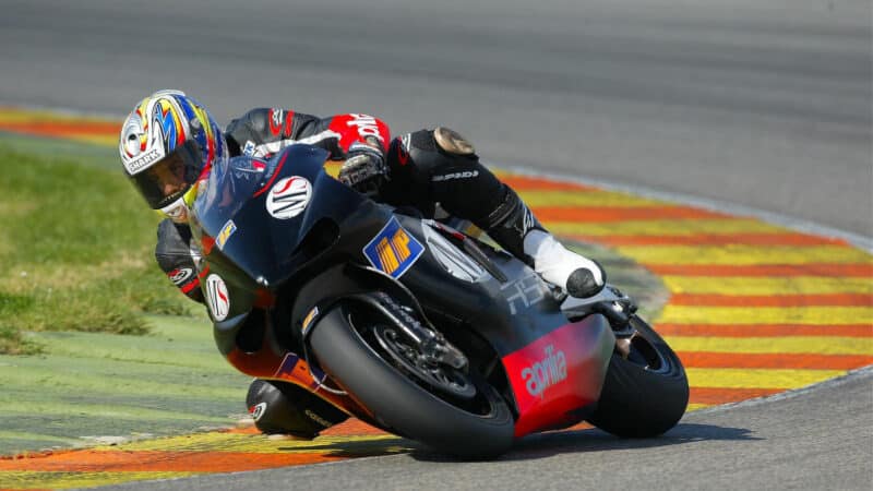 A wide-eyed Regis Laconi aboard Aprilia’s 2002 RS Cube