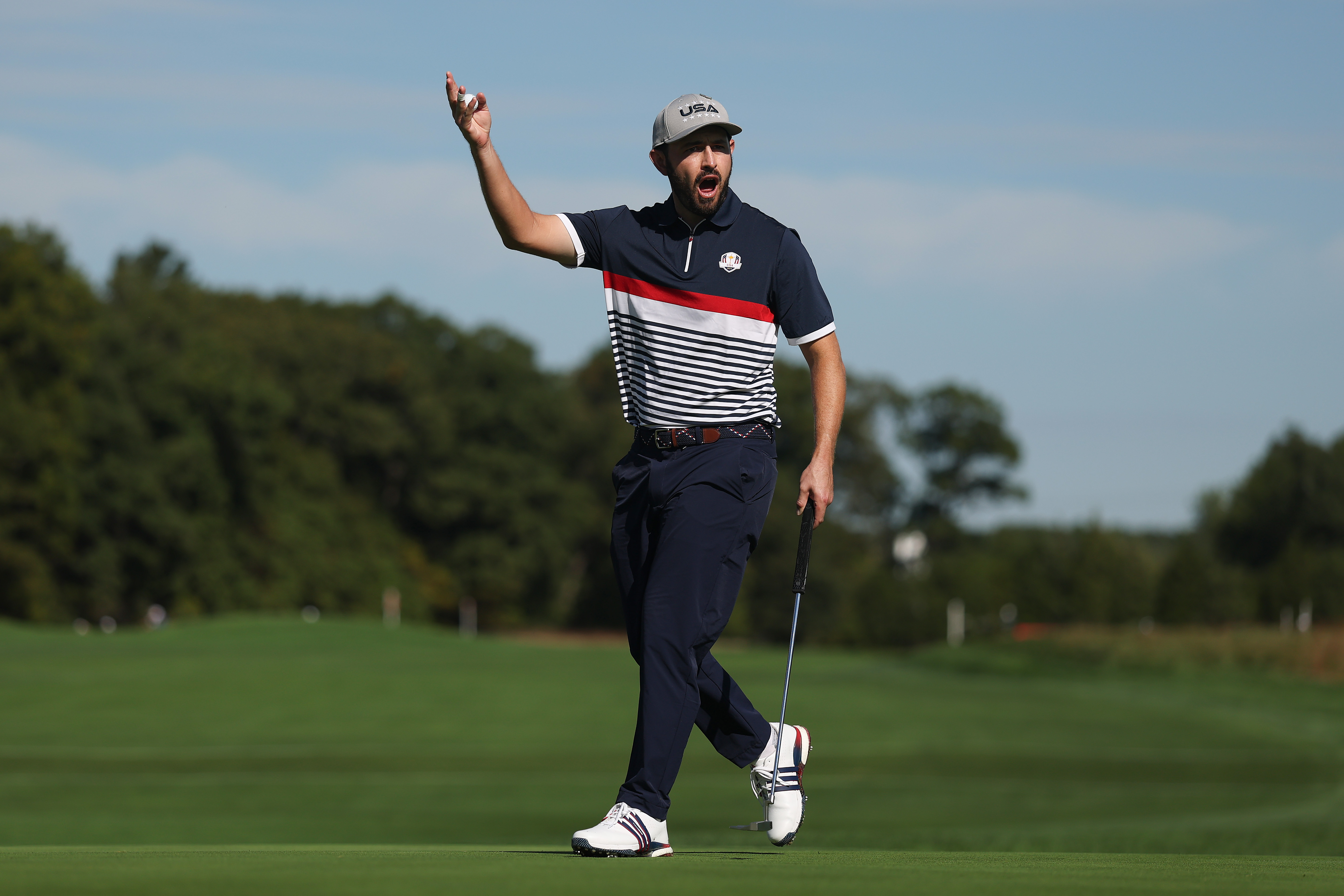Patrick Cantlay celebrates after holing a putt at the Ryder Cup