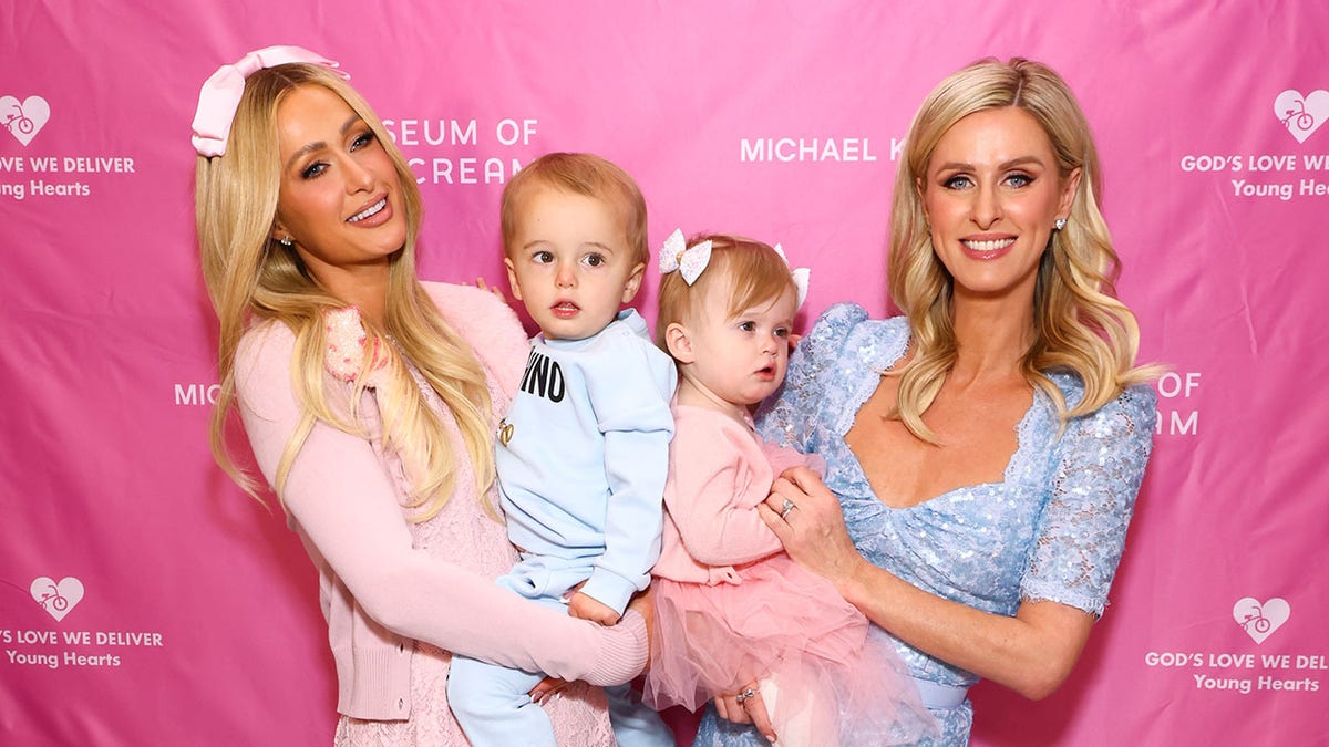 Paris Hilton is seen with her two babies and her sister Nicky Hilton during an outing in New York City.