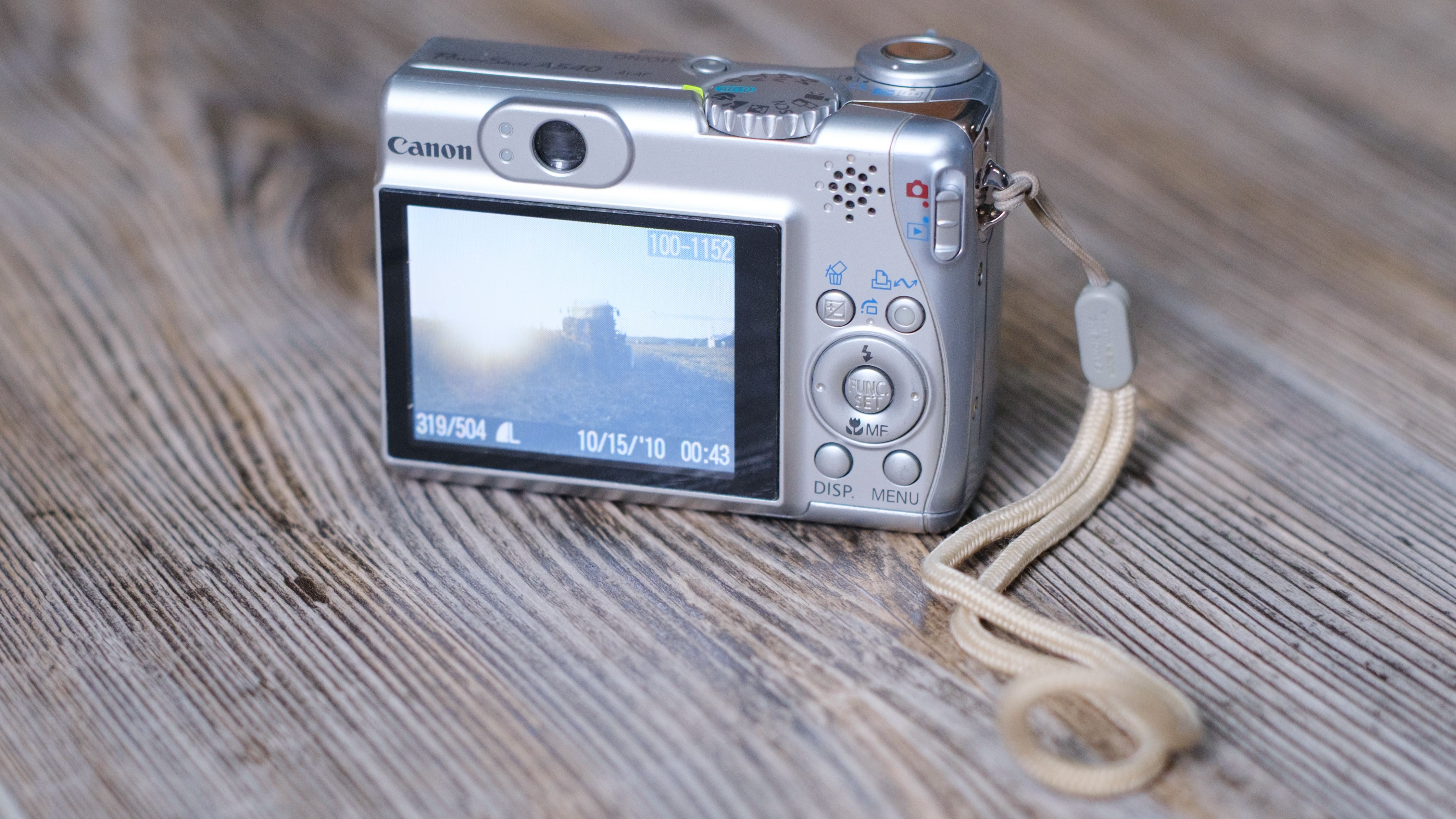 The Canon PowerShot A540 on a wood background