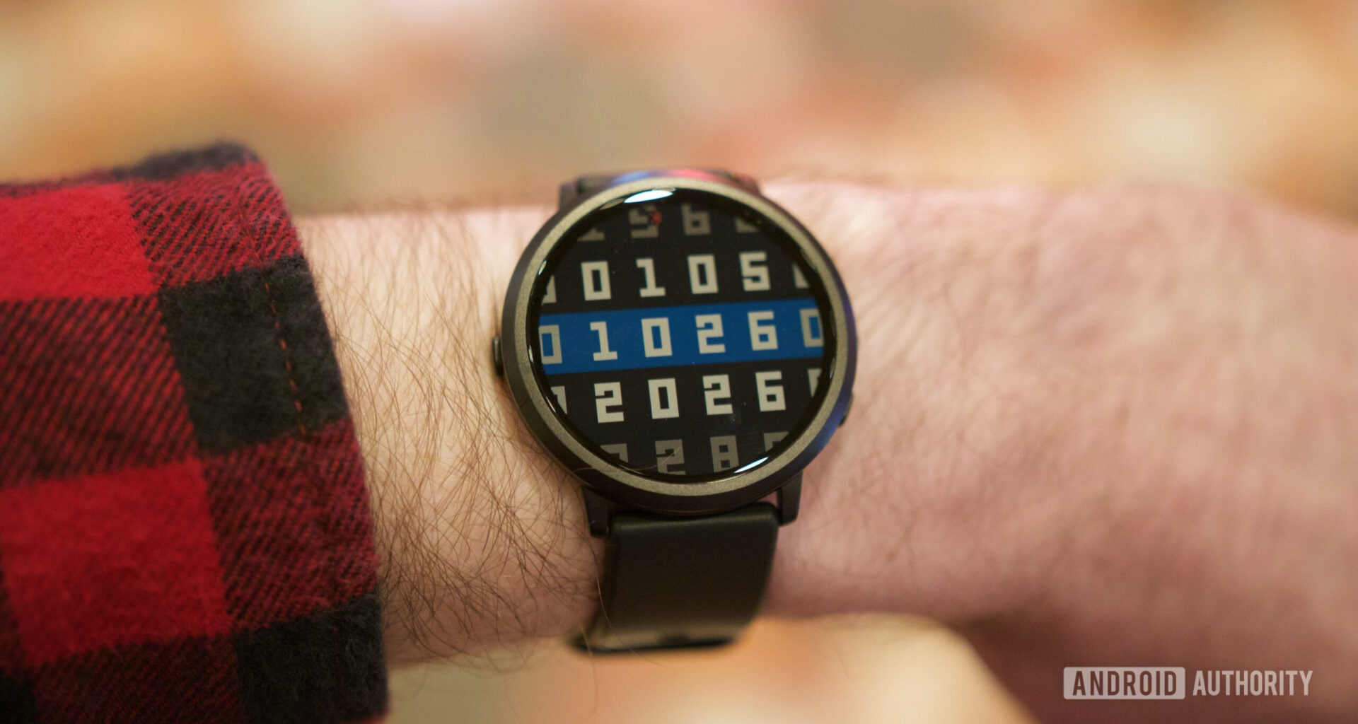 Someone wearing the Pebble Round 2.