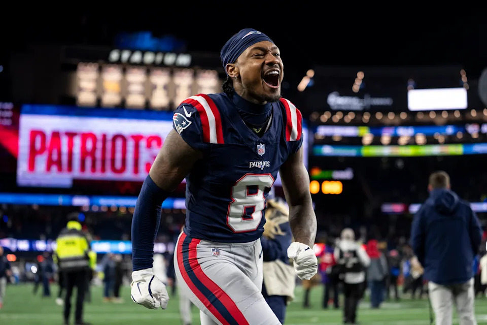 Stefon Diggs runs off the field celebrating the victory. (Michael Owens/Getty Images)