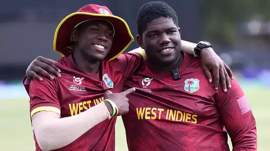 shaquan-belle-left-and-zachary-carter-right-celebrate-after-west-indies-won