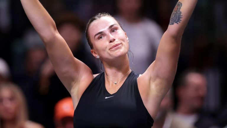 Aryna Sabalenka acknowledges the crowd following defeat to Nick Kyrgios in The 'Battle of the Sexes' exhibition match