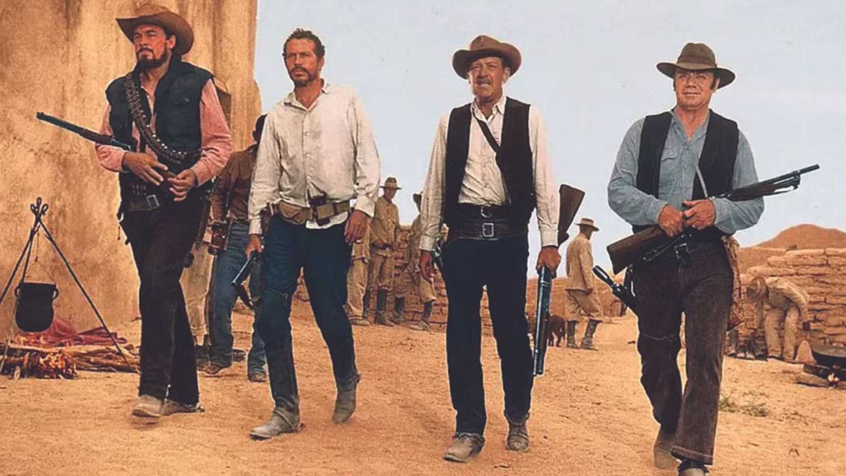 The gang walking down the street with guns in The Wild Bunch