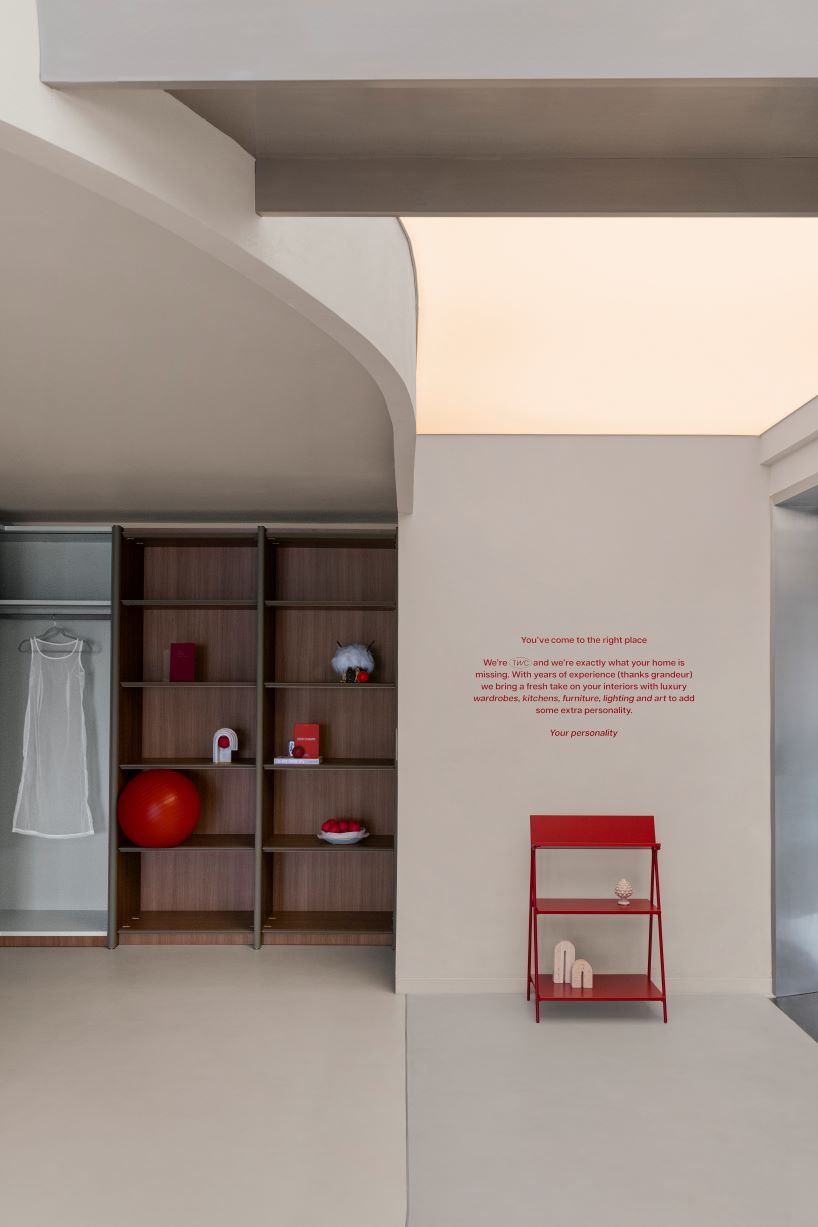 concrete and steel textures shape showroom in india organized as a continuous loop