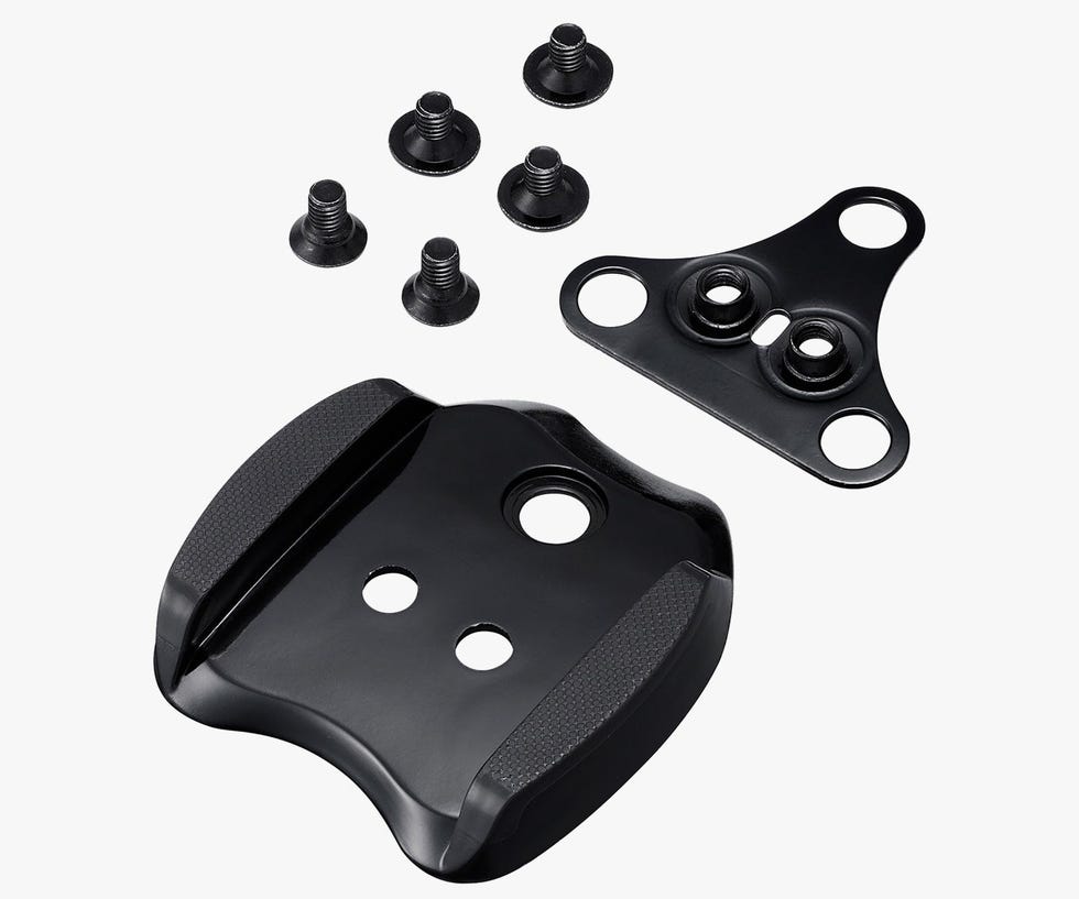 black cycling cleat assembly with screws