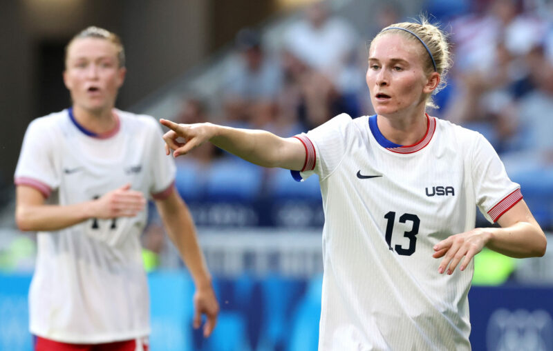 LYON, FRANCE - AUGUST 06: Jenna Nighswonger #13 of Team United States gestures to her teammates during the Women's semifinal match between United S...