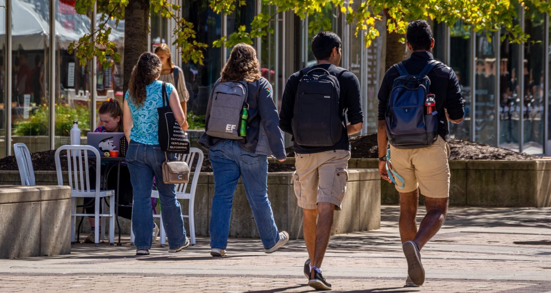 Students walking on East Campus Mall on the University of Wisconsin-Madison campus.