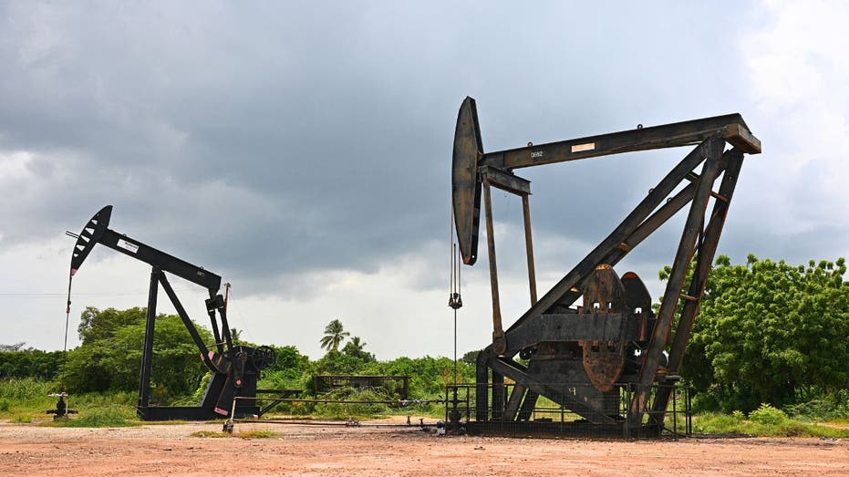 Oil pumpjacks operating in a field near Lake Maracaibo in Venezuela.