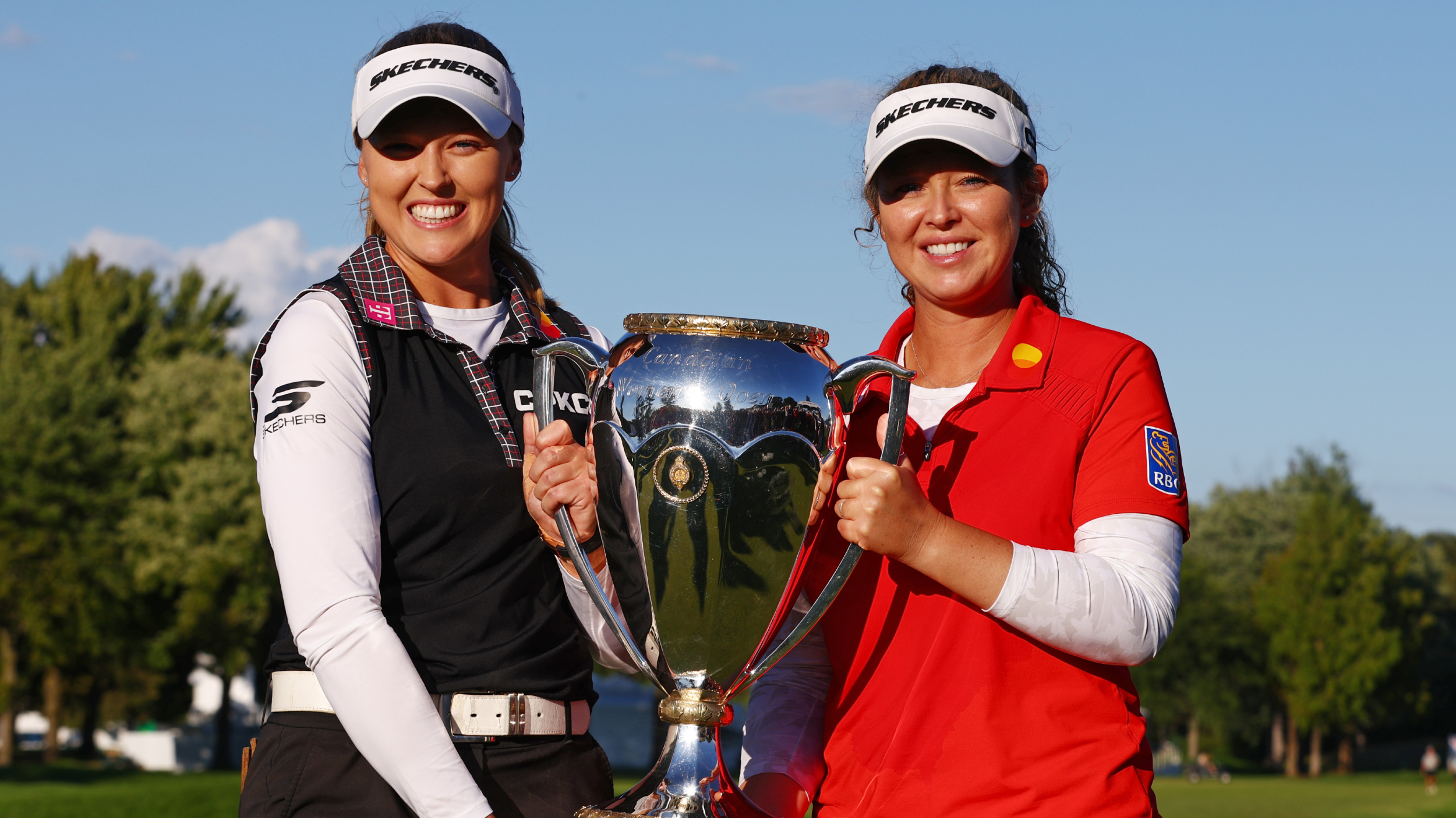 Brooke and Brittany Henderson with the CPKC Women's Open trophy