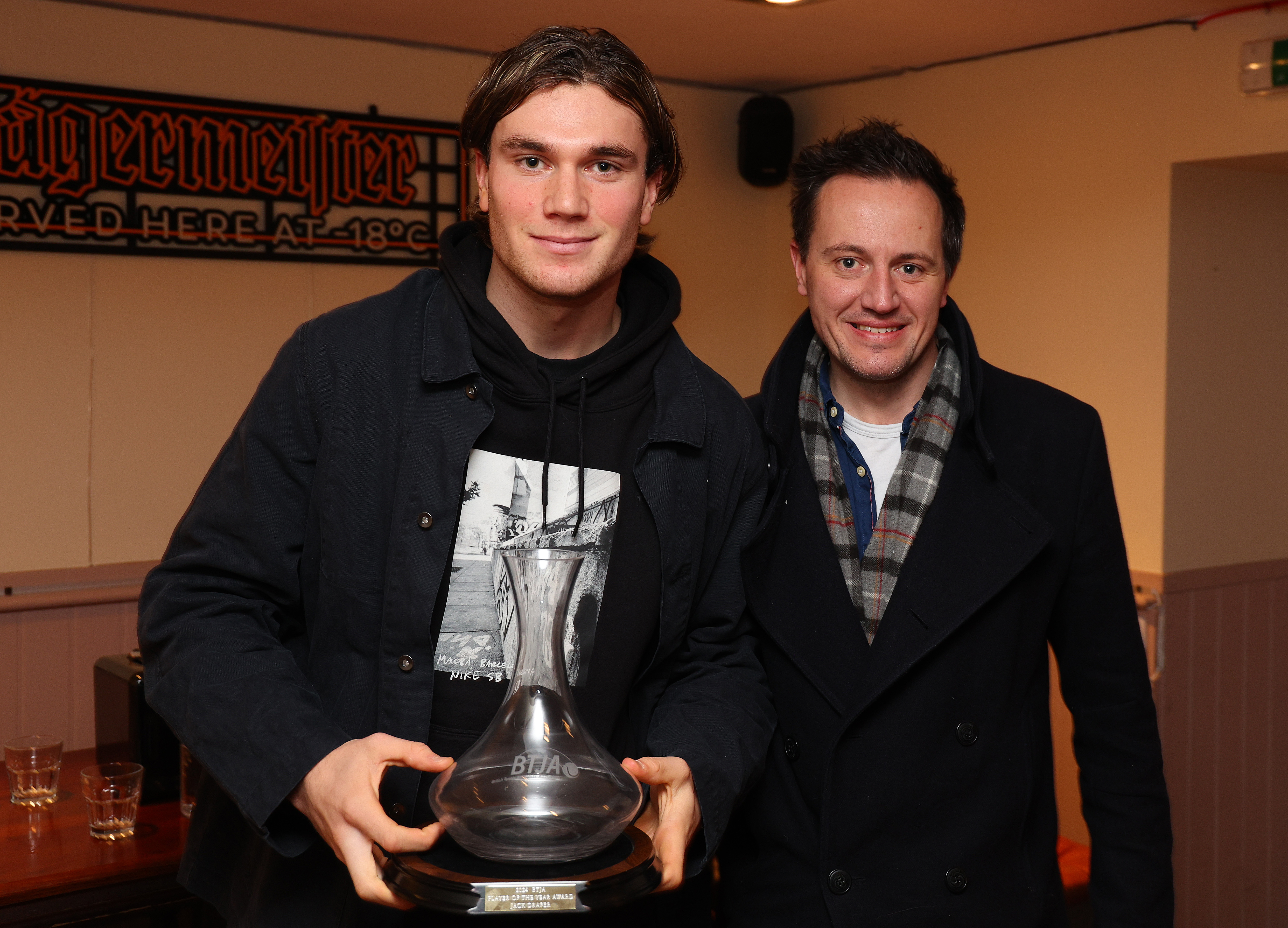 Jack Draper with his BTJA Player of the Year award, presented by Stuart Fraser.