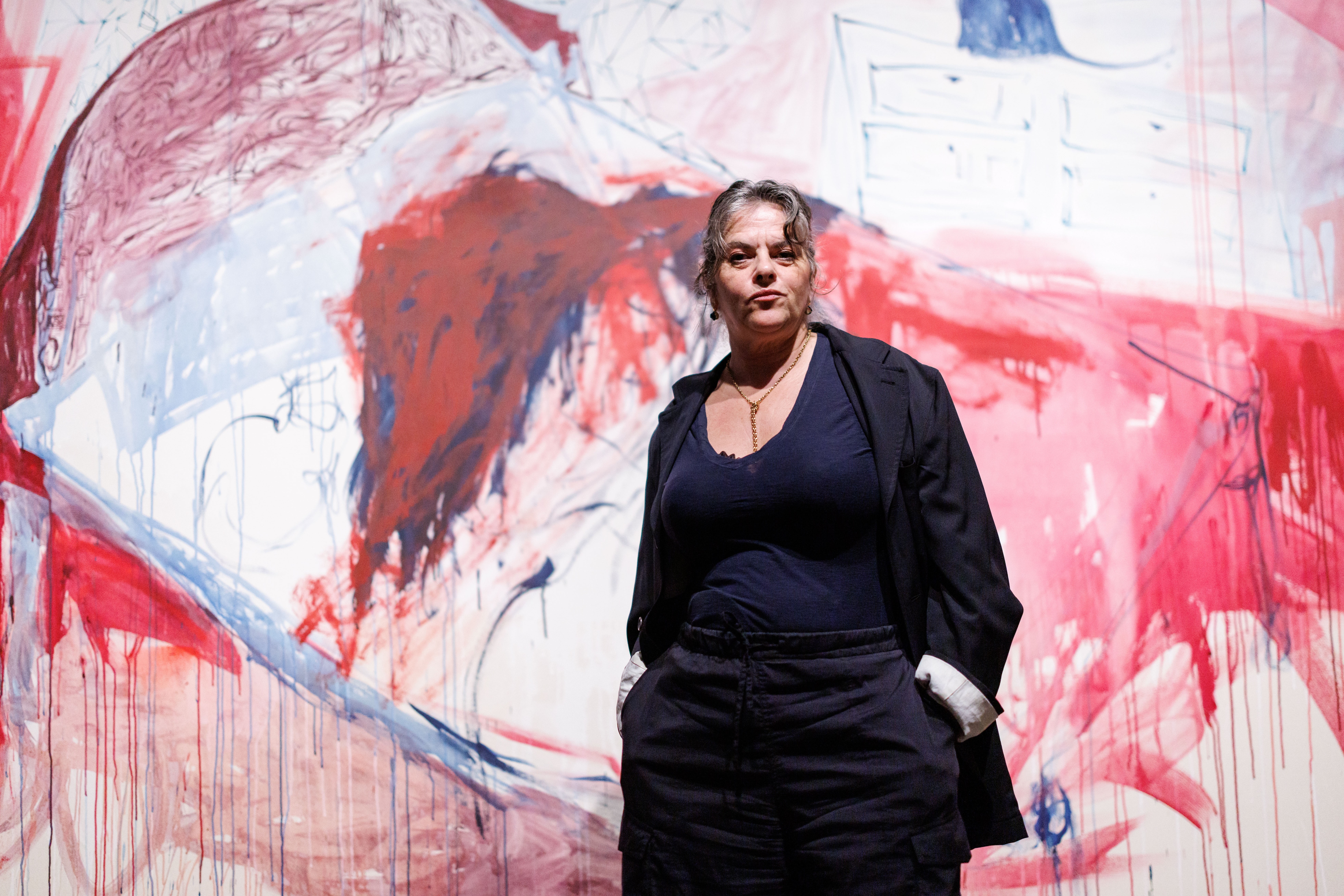 Artist Tracey Emin poses with her painting "The End of Love" at Tate Modern.