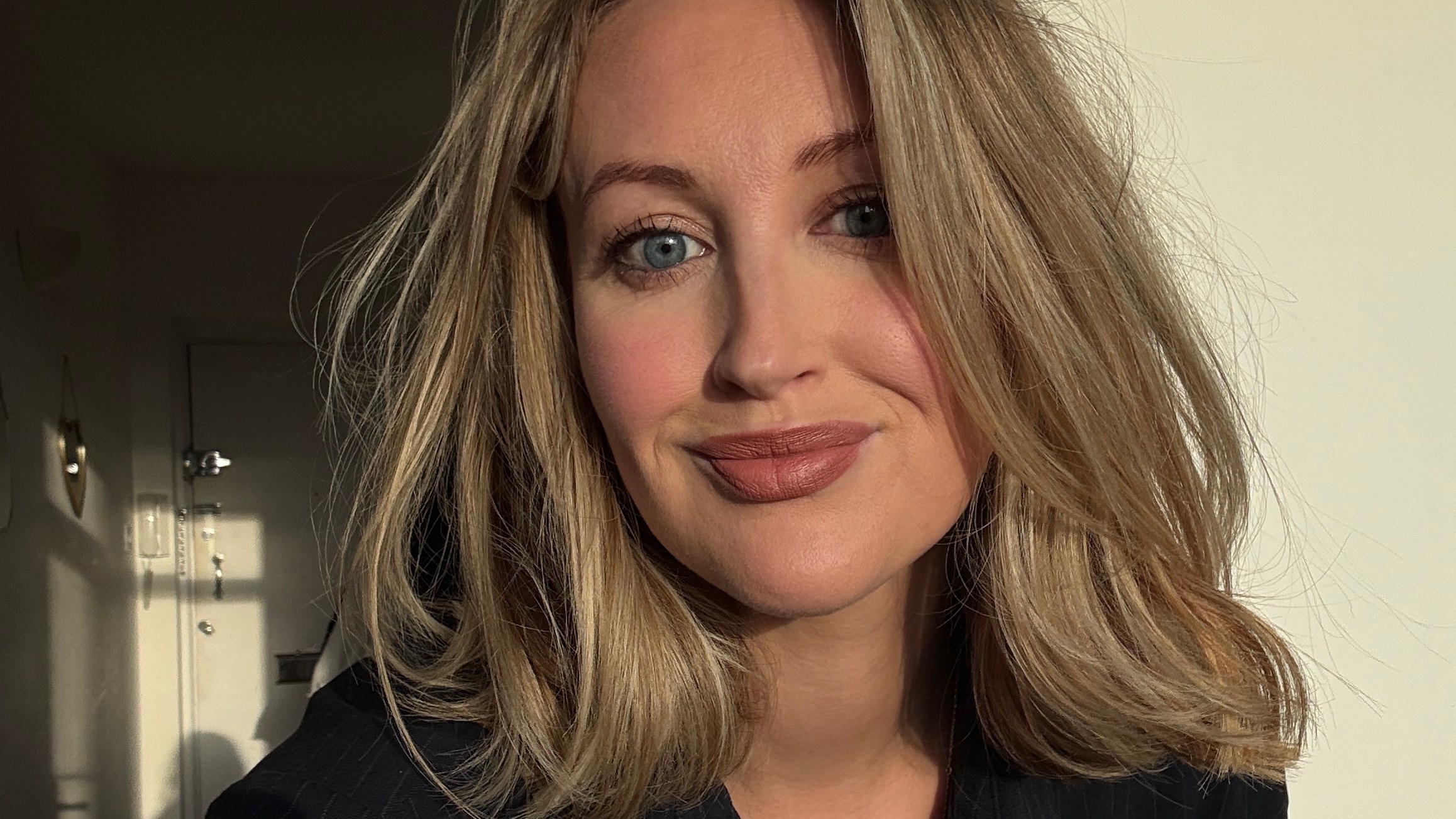 Lottie Patterson, a woman with blonde hair, smiling.