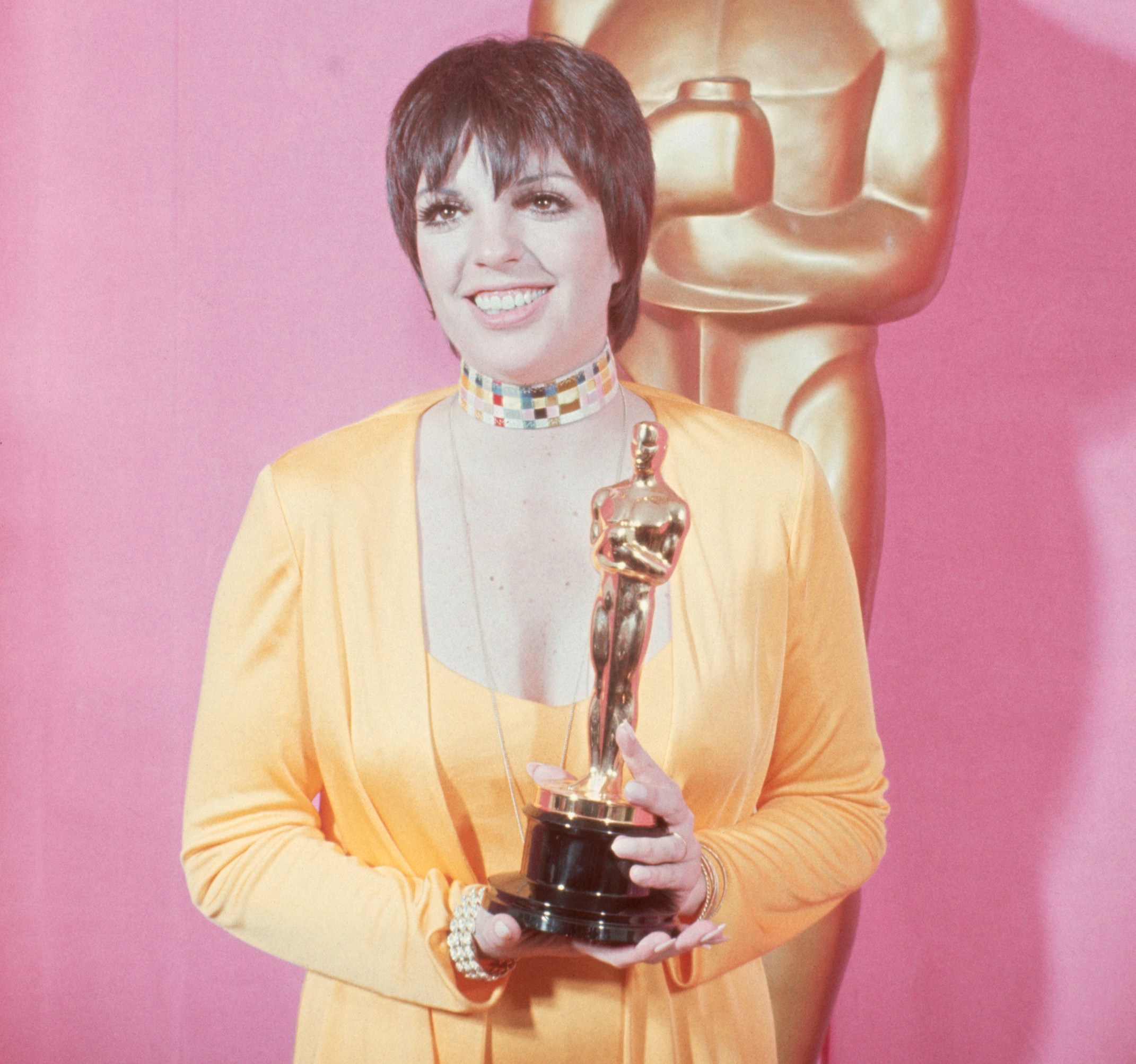 Liza Minneli Holds Her Oscar, Smiling