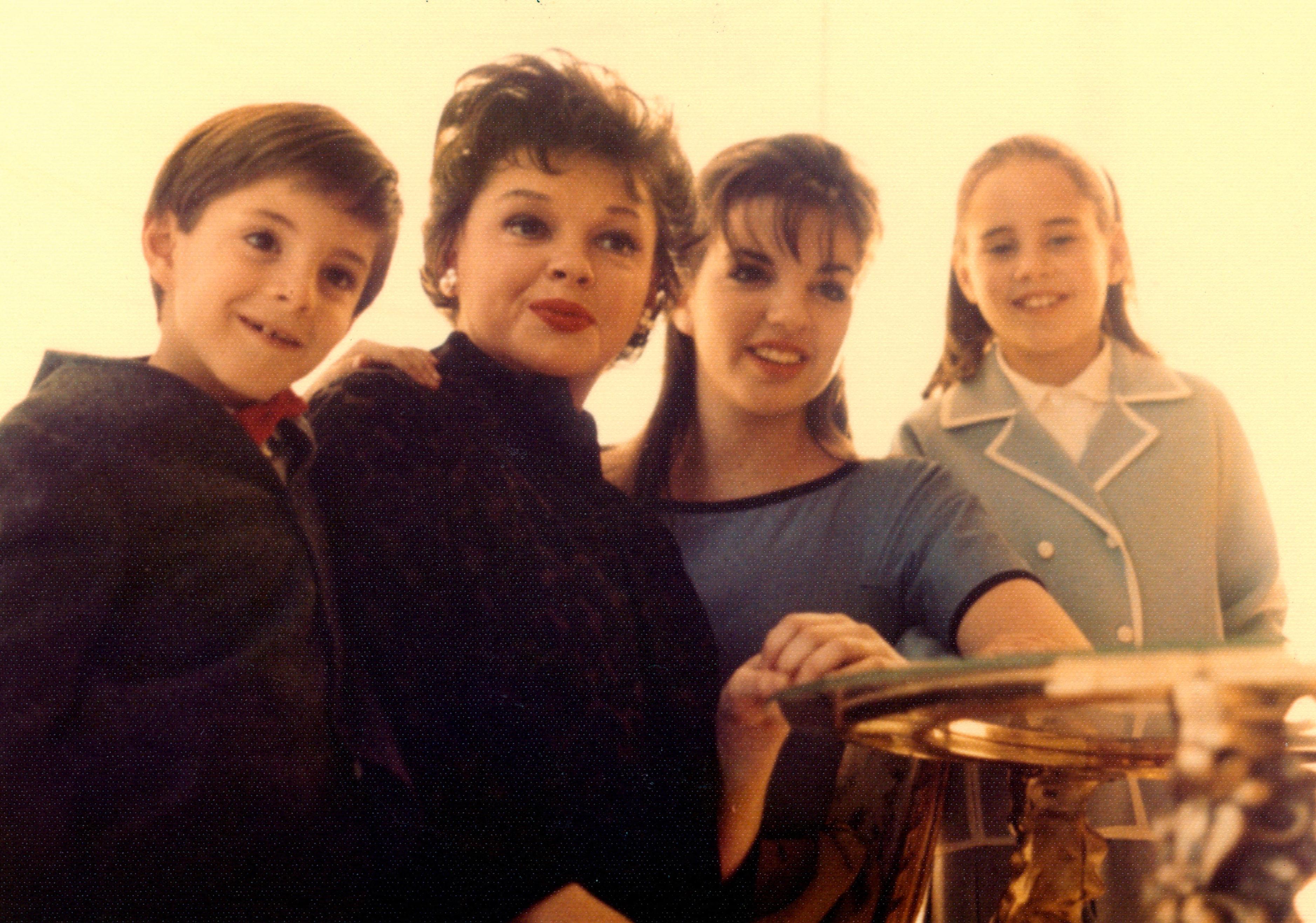 Judy Garland, with her children, from left, Joey Luft, Liza Minnelli, and Lorna Luft, 1962