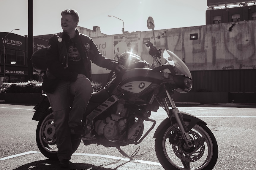 Woman near motorbike. 