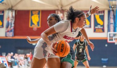 Freshman forward Jordan Washington pushes past Diablo defense during the game on Friday, Jan. 30 at home.