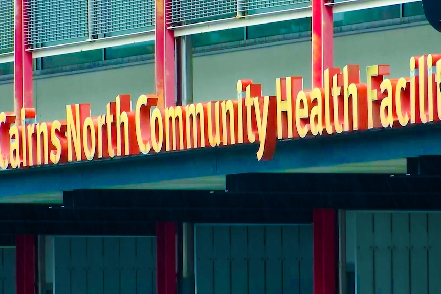 street shots of signage around a public health building.
