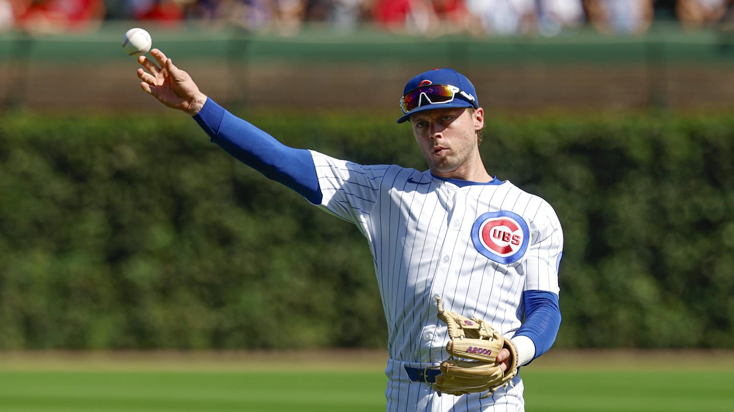 Sep 27, 2025; Chicago, Illinois, USA; Chicago Cubs second baseman Nico Hoerner (2) warms up before a baseball game against the St. Louis Cardinals at Wrigley Field. Mandatory Credit: Kamil Krzaczynski-Imagn Images