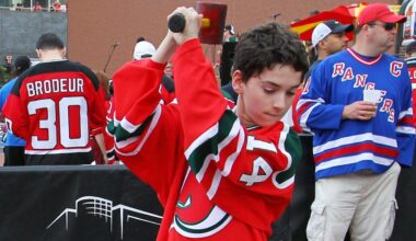May 25, 2012; Newark, NJ, USA; A young fan hits a New York Rangers logo before game six of the 2012 Eastern Conference Finals at the Prudential Center.  Mandatory Credit: Ed Mulholland-Imagn Images