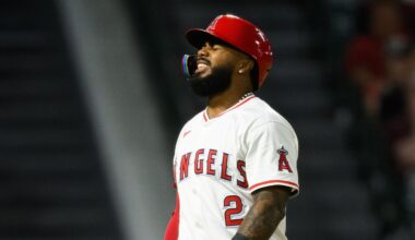 Sep 25, 2025; Anaheim, California, USA; Los Angeles Angels third baseman Luis Rengifo (2) reacts after fouling a ball off his foot during the eighth inning against the Kansas City Royals at Angel Stadium. Mandatory Credit: William Liang-Imagn Images