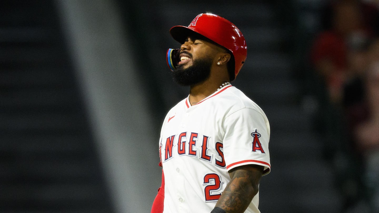 Sep 25, 2025; Anaheim, California, USA; Los Angeles Angels third baseman Luis Rengifo (2) reacts after fouling a ball off his foot during the eighth inning against the Kansas City Royals at Angel Stadium. Mandatory Credit: William Liang-Imagn Images