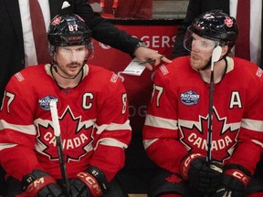 Canadian hockey forwards Sidney Crosby (left) and Connor McDavid.