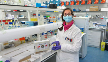 Rosa Santomartino, assistant professor of biological and environmental engineering in the College of Agriculture and Life Sciences, prepares samples for the launch to the International Space Station.