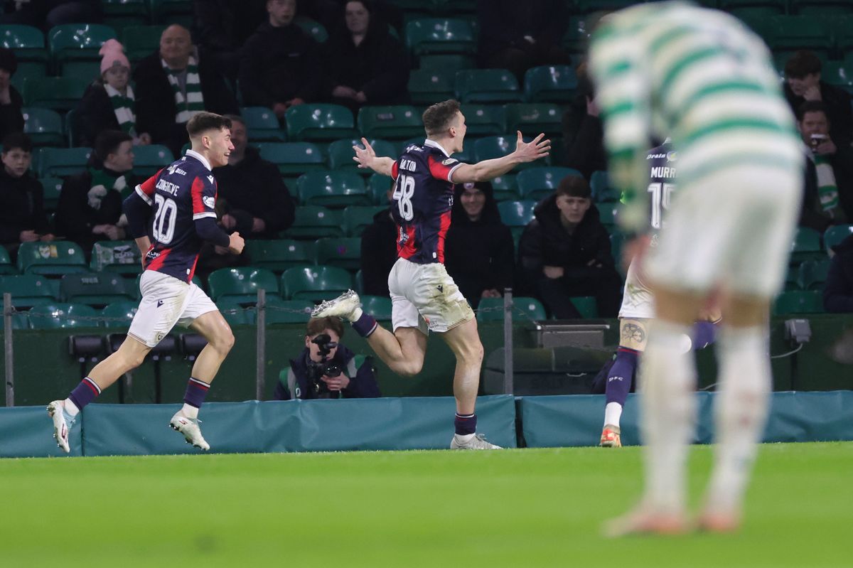 Dundee's Ethan Hamilton (centre), celebrates scoring vs Celtic