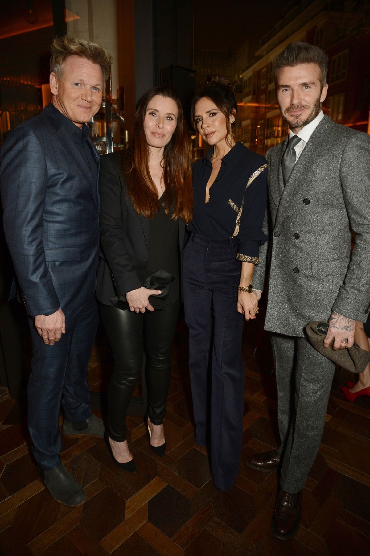 Gordon and Tana Ramsay pose with Victoria and David Beckham on a fancy night out
