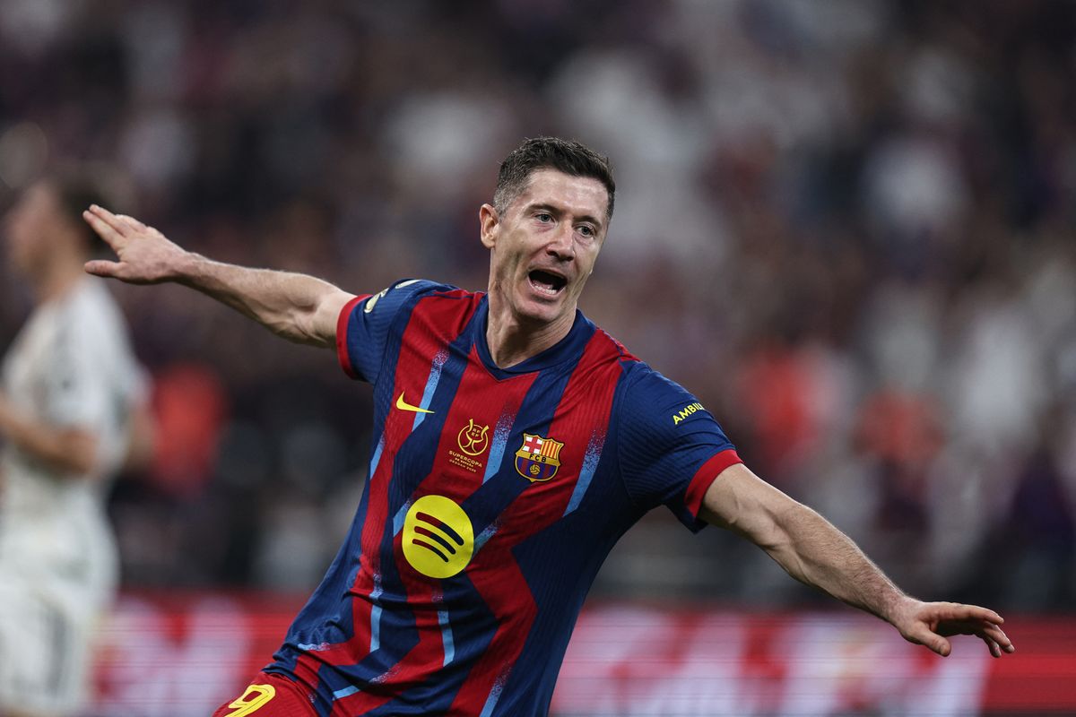 TOPSHOT - Barcelona's Polish forward #09 Robert Lewandowski celebrates after scoring his team's second goal during the Spanish Super Cup final football match between FC Barcelona and Real Madrid at the King Abdullah Stadium in Jeddah on January 11, 2026. (Photo by Fadel SENNA/AFP via Getty Images)