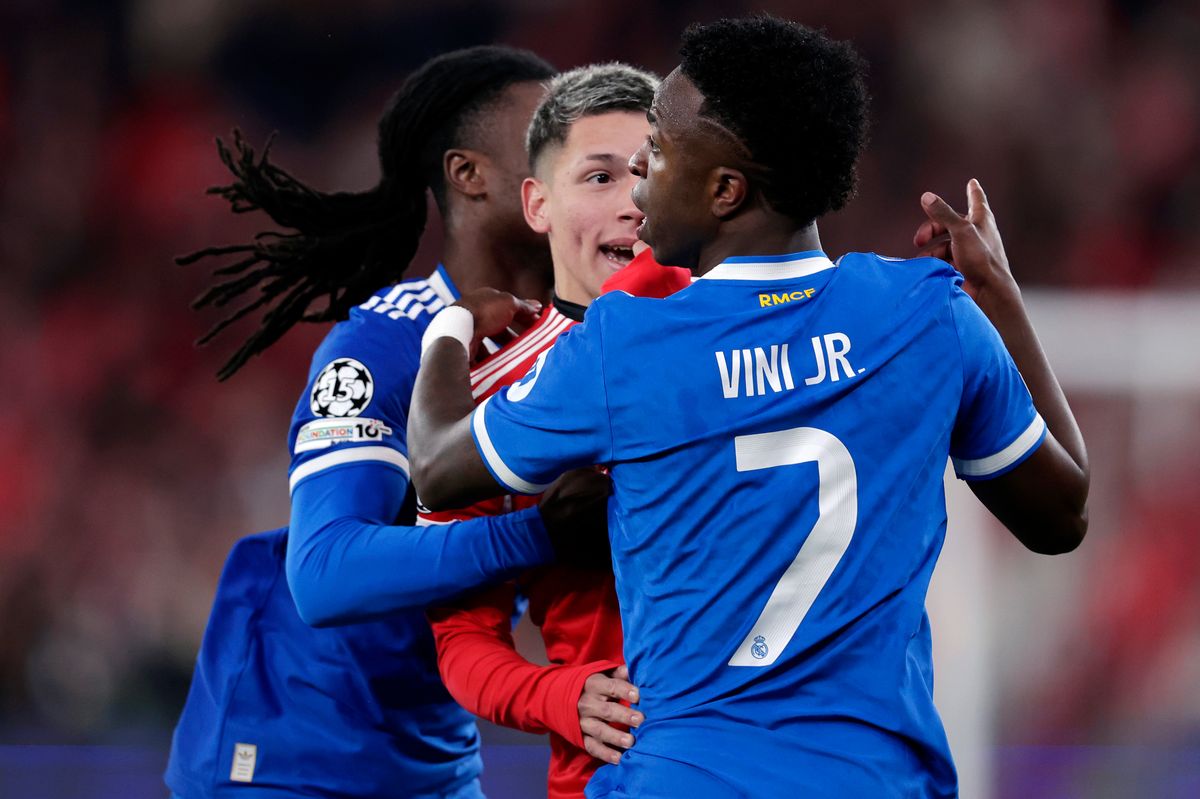 Vinicius Junior of Real Madrid in a clash with Gianluca Prestianni of Benfica