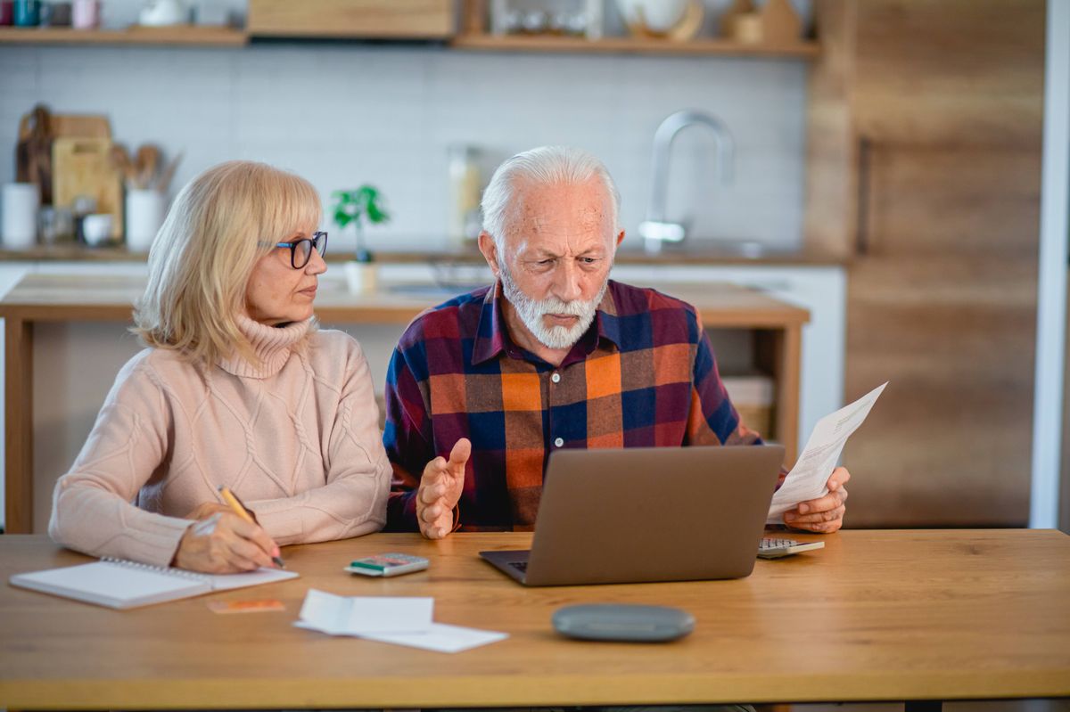 Senior couple problem with household finances and bills